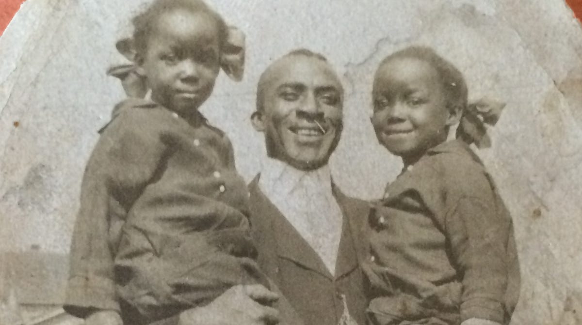 Robert C. Fanning with twin daughters Jessie and Bessie Fanning, date uncertain. Robert was the son of Roscoe Fanning, born 1922. He shares DNA with his great-niece Lisa Fanning. Her family has a common ancestor with Nadine Kearns, wife of Andre Kearns, who lived about 200 years ago. Lisa Fanning and Andre Kearns were able to find the connect through their work with both historical genealogical records and DNA testing.