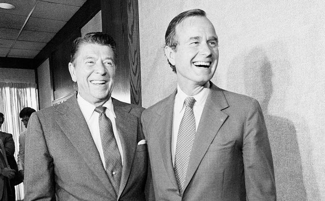 Then-Gov. Ronald Reagan, the Republican Party's nominee for president and his vice-presidential nominee George H.W. Bush