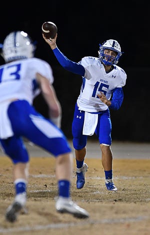 Brevard's Mitchell Johnson looks for a receiver against Wheatmore.