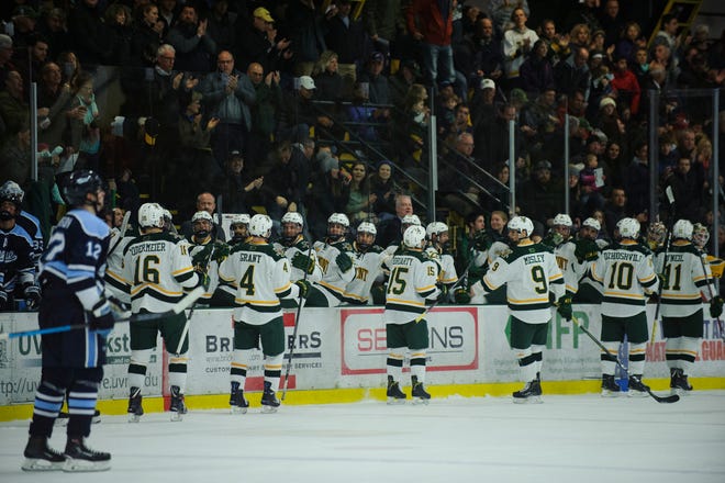 Vermont celebrates a goal during the men's hockey game between the Mine Black Bears and the Vermont Catamounts at Gutterson Field House on Friday night November 30, 2018 in Burlington.