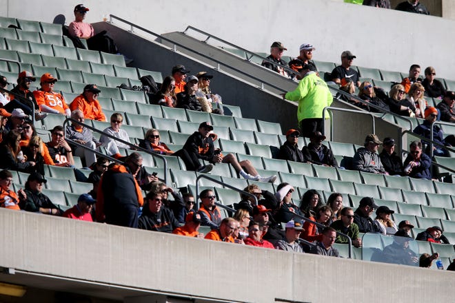Empty seats are seen as the Cincinnati Bengals takes the field in the second quarter of a Week 13 NFL football game against the Denver Broncos, Sunday, Dec. 2, 2018, at Paul Brown Stadium in Cincinnati. 