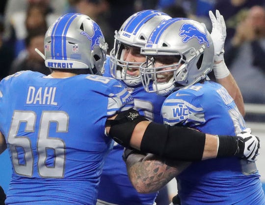 Detroit Lions left tackle Taylor Decker, right, celebrates his touchdown with lineman Joe Dahl against the Los Angeles Rams during the second half Sunday, Dec. 2, 2018 at Ford Field in Detroit.