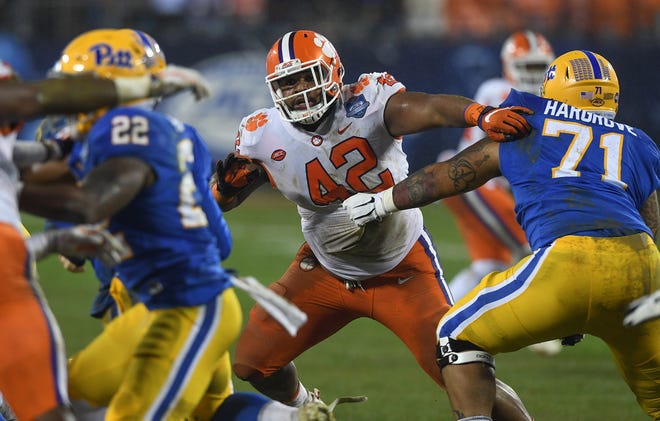Clemson defensive lineman Christian Wilkins (42) plays against Pittsburgh during the 1st quarter of the Dr. Pepper ACC Championship at Bank of America Stadium in Charlotte, N.C. Saturday, December 1, 2018.