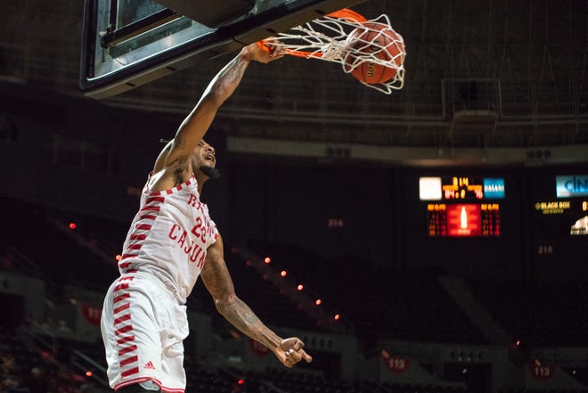 UL's Jakeenan Gant scores with a dunk as the Ragin' Cajuns play against the Southern University Jaguars at the Cajundome on December 1, 2018.