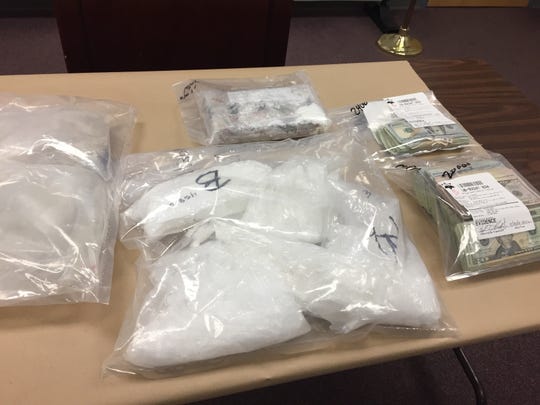 Kilos of fentanyl (top), meth (bottom) and heroin (left) were seized during a drug raid in the Village of Deposit.