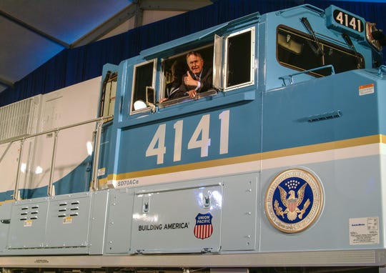 George H.W. Bush in the cab of Union Pacific Locomotive No. 4141 at its 2005 unveiling.