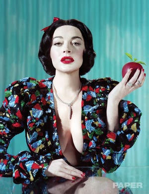 In a Snow White-inspired photo, Lindsay Lohan poses for Paper magazine.
