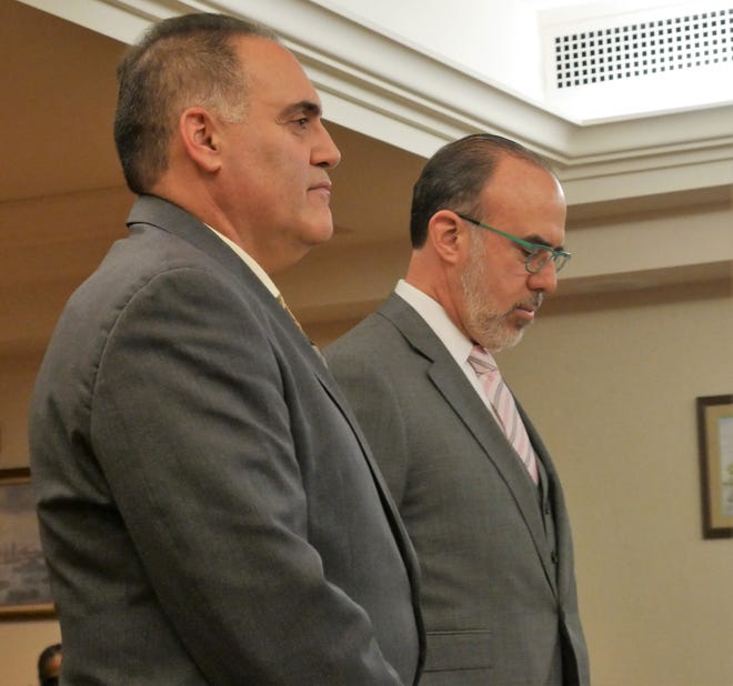 Steven Schwartz (left), stands with his attorney Joseph Tock, in Dutchess County Court on Dec. 4, 2018. Schwartz, a former Wappingers district elementary school teacher, pleaded guilty to one felony count of possessing a sexual performance by a child.