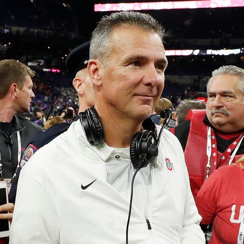 Ohio State Buckeyes coach Urban Meyer with his...