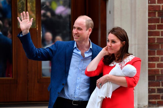 Prince William and Duchess Kate of Cambridge show off Prince Louis, their newly-born son and third child, to the media outside St Mary's Hospital in London, on April 23, 2018.