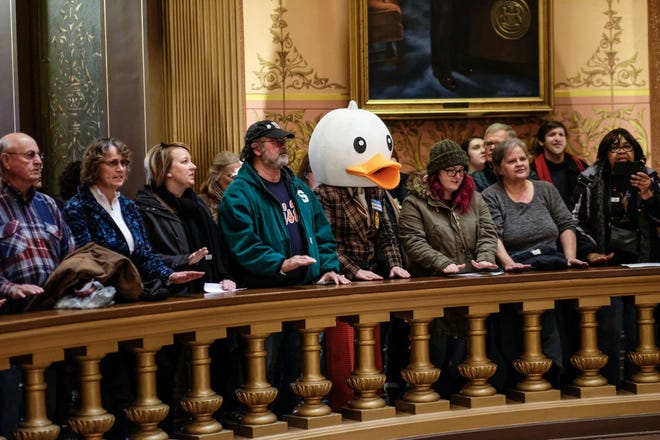 People line the Capitol Rotunda balcony protesting the lame duck legislation proposed by Republicans Tuesday, Dec. 4, 2018.