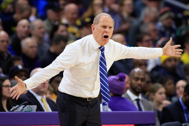 Michigan's John Beilein reacts to a play in the game.