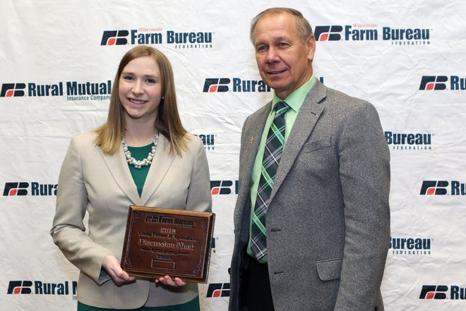Kelly Wilfert of Manitowoc County was selected as the winner of the 2018 Wisconsin Farm Bureau Federation Young Farmer and Agriculturist Discussion Meet contest at the organization’s 99th Annual Meeting in Wisconsin Dells on Dec. 2. She is pictured with Farm Bureau President Jim Holte. 