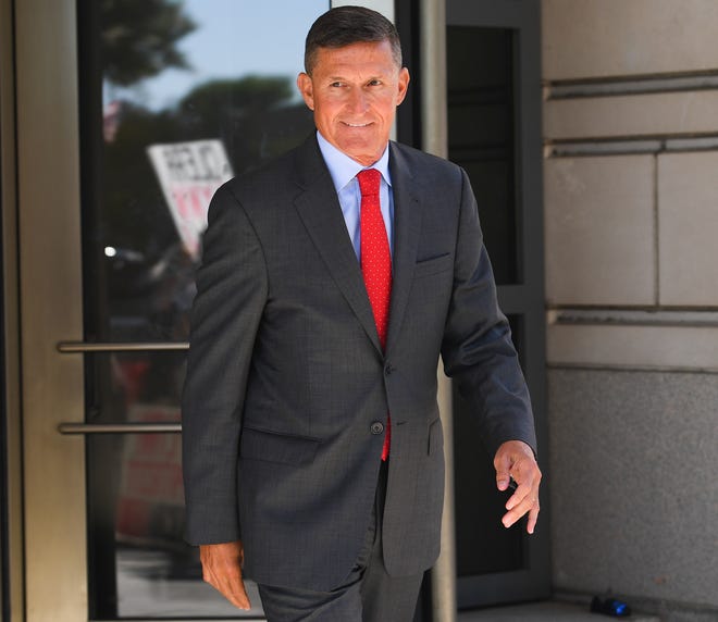 Former national security adviser Michael Flynn leaves after an appearance at U.S. District Court for the District of Columbia.