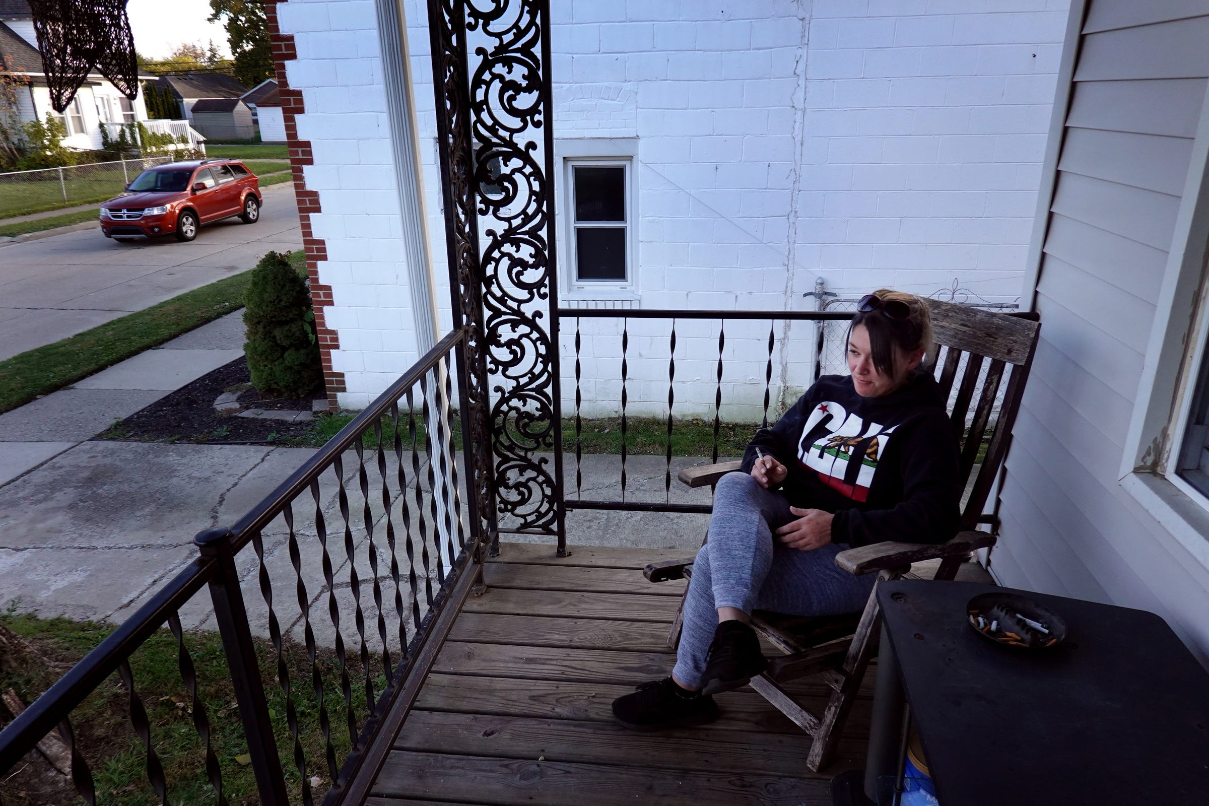 Megan Ferranti, 29 waits for her peer recovery coach to meet at the 3/4 house where she currently resides at in Roseville.