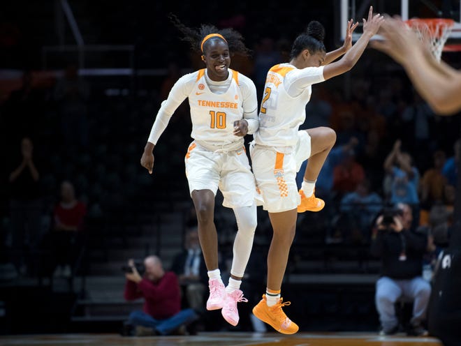 Tennessee’s Meme Jackson (10) and Evina Westbrook (2) celebrate during the game against Stetson at Thompson-Boling Arena on Wednesday, December 5, 2018.