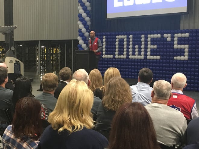 Lowe's President and CEO Marvin Ellison addresses the crowd gathered for the grand opening of the company's new distribution center in Coopertown, Tenn. on Thursday, Dec. 6, 2018