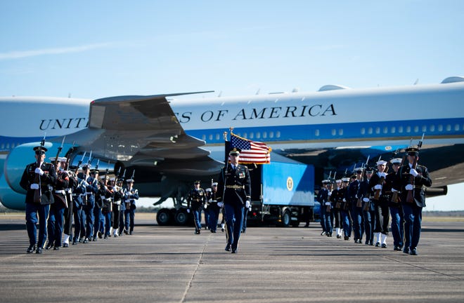 U.S. service members with the Joint Forces Honor Guard participate in a departure ceremony for former President George H.W. Bush A military honor guard walks off after taking part in a departure ceremony honoring former President George H.W. Bush in front of the Special Air Mission 41 plane at Ellington Field Joint Reserve Base in Houston, Texas, Dec. 3, 2018. Nearly 4,000 military and civilian personnel from across all branches of the U.S. armed forces, including Reserve and National Guard components, provided ceremonial support during George H.W. Bush’s, the 41st President of the United States state funeral.