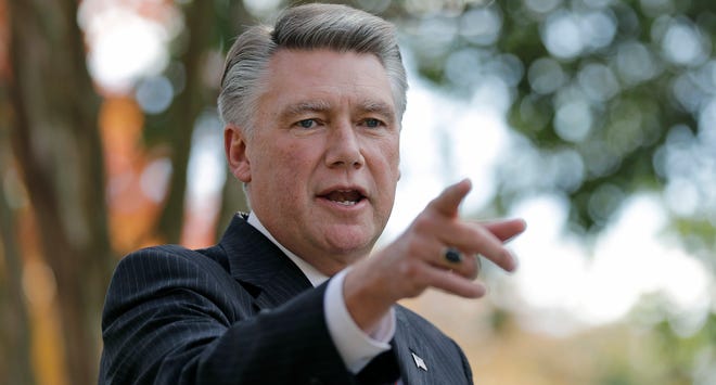 Mark Harris speaks to the media during a news conference in Matthews, N.C., Nov. 7, 2018.