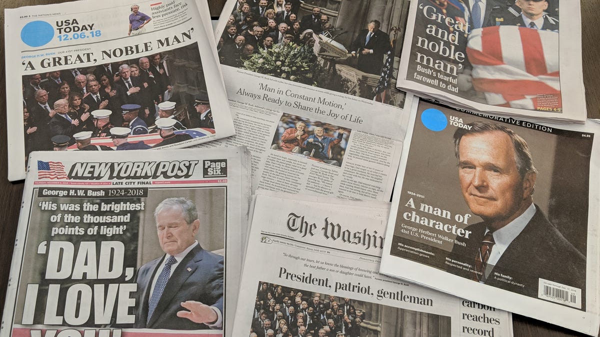USA TODAY, The Washington Post, the New York Daily News, the New York Times, the New York Post and a USA TODAY commemorative tab show images from George H.W. Bush's state funeral.