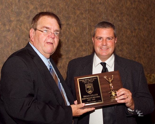 Bishop Brossart athletic director Mel Webster, left, and 2013 inductee Brian Goller, current boys soccer coach at Brossart, were at the recent Northern Kentucky Athletic Directors Association Hall of Fame induction.