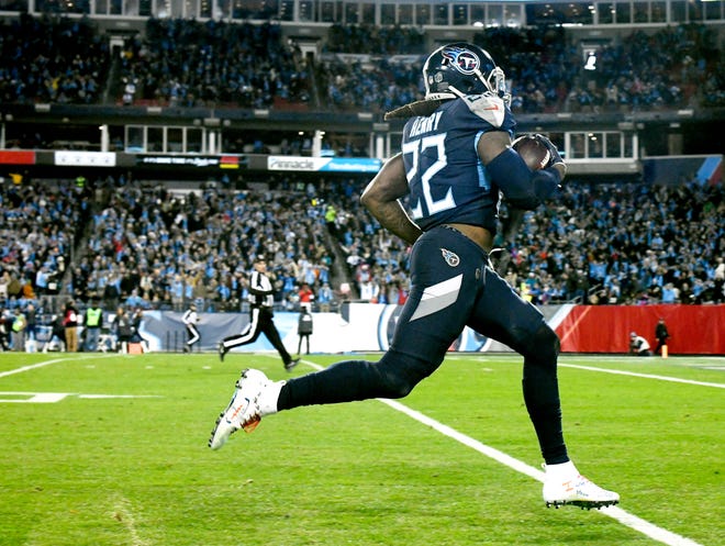 Titans running back Derrick Henry (22) scores his fourth touchdown of the game in the third quarter Thursday.
