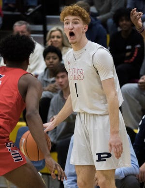 Pinnacle's Nico Mannion shouts out a play against San Joaquin Memorial's Jalen Green during in the first half of their game in Scottsdale, Thurs, Dec. 6, 2018. 