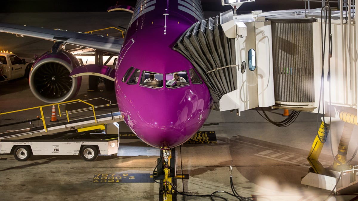 A WOW Air Airbus A321neo pulls into the gate at Boston Logan International Airport in October 2018.