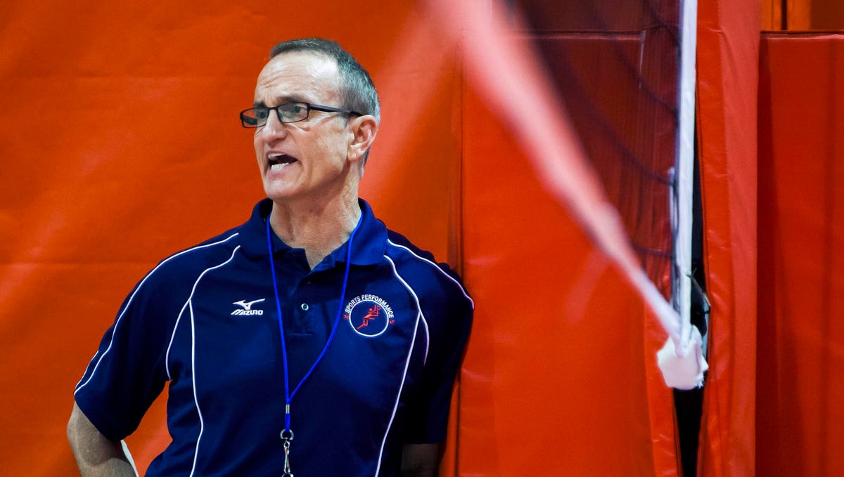In this Aug. 4, 2014, photo, Rick Butler, a nationally renowned volleyball coach from Chicago, watches a scrimmage during the first day of a volleyball camp at Abbott Sports Complex in Lincoln, Neb. Michigan State University has maintained ties to Butler for decades after he was publicly accused in 1995 of sexually abusing and raping six underage girls he trained in the 1980s. Letters obtained by The Associated Press from accusers' advocates show the   school has been under pressure since at least 2017 to sever ties with Butler.