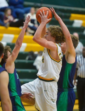 CMR's Kaden Gardner looks for an open teammate during Friday night's basketball game against Glacier in the CMR Fieldhouse.