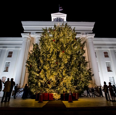 People gather after the State Capitol Christmas...
