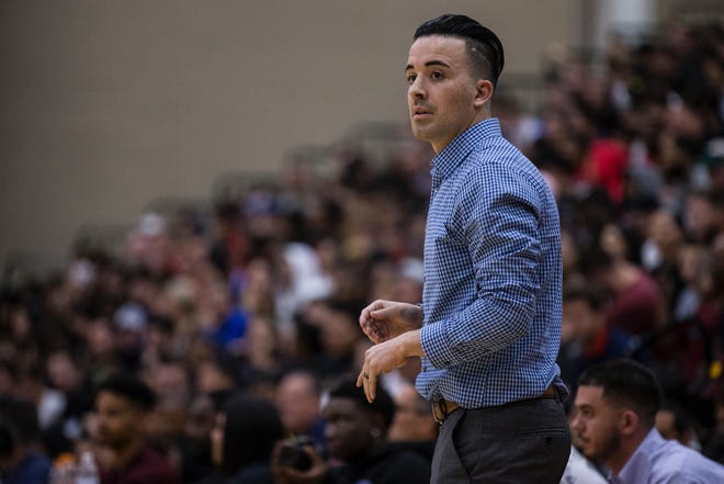 Scottsdale Bella Vista Prep head coach Kyle Weaver watches during the Hoophall West game against Spire Academy on Friday, Dec. 7, 2018, at Chaparral High School in Scottsdale, Ariz.
