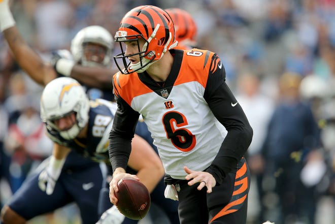Cincinnati Bengals quarterback Jeff Driskel (6) runs out of the pocket in the first quarter of a Week 14 NFL football game against the Los Angeles Chargers, Sunday, Dec. 9, 2018, at StubHub Center in Carson, California. 