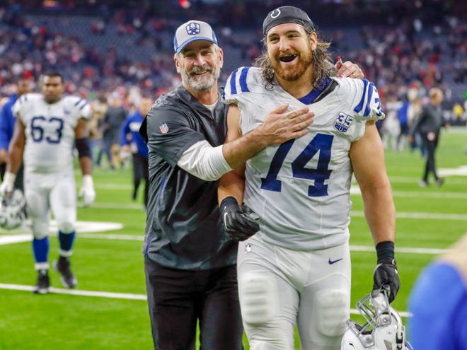Indianapolis Colts head coach Frank Reich celebrates with offensive tackle Anthony Castonzo (74) after the team's win over the Houston Texans at NRG Stadium in Houston on Sunday, Dec. 9, 2018.