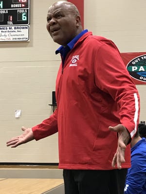 Evangel boys coach Leon Neal coaches during Saturday's Parkway Tournament.