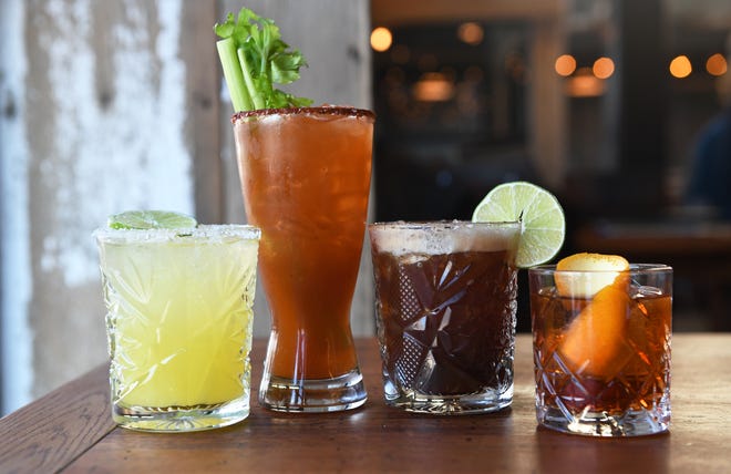A Central Margarita (from left), a Michelada, a Cold Brew Margarita and an Oaxaca Old Fashioned are displayed at Central Taco And Tequila in Westmont. The bar and restaurant on Haddon Avenue in the former Irish Mile location opens Monday.