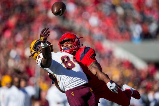 Arizona's Troy Young is flagged for pass interference against Arizona State's Frank Darby during the first half of the Territorial Cup on  Nov. 24, 2018, at Arizona Stadium in Tucson.