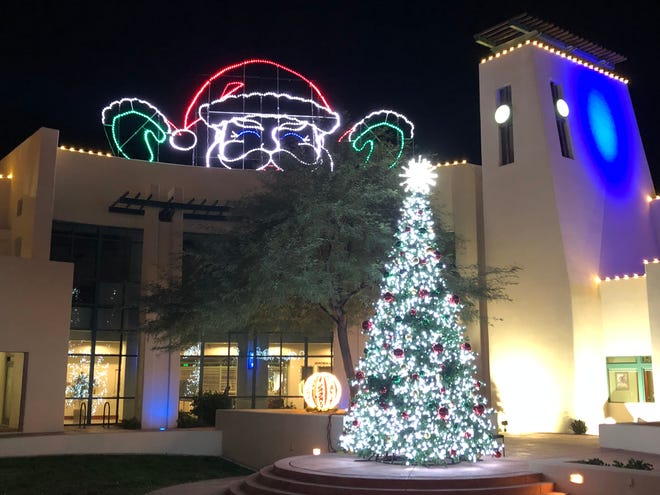 Mesquite City Hall adorned with the holiday Christmas tree and blue light for Project Blue Light, during the Parade of Lights Food Drive on Dec. 5, 2018.
