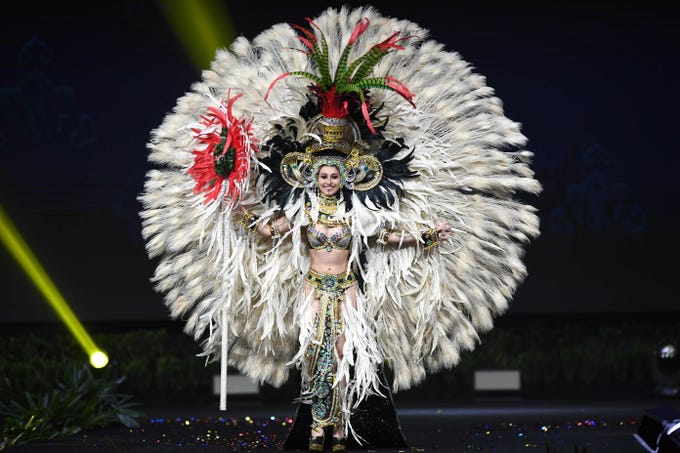 Mariana García, Miss Guatemala 2018 walks on stage during the 2018 Miss Universe national costume presentation in Chonburi province on December 10, 2018. (Photo by Lillian SUWANRUMPHA / AFP)LILLIAN SUWANRUMPHA/AFP/Getty Images ORIG FILE ID: AFP_1BH7PR