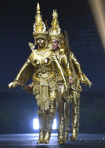 On-anong Homsombath, Miss Laos 2018 walks on stage during the 2018 Miss Universe national costume presentation in Chonburi province on December 10, 2018. (Photo by Lillian SUWANRUMPHA / AFP)LILLIAN SUWANRUMPHA/AFP/Getty Images ORIG FILE ID: AFP_1BH881