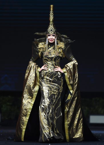 Dolgion Delgerjav, Miss Mongolia 2018 walks on stage during the 2018 Miss Universe national costume presentation in Chonburi province on December 10, 2018. (Photo by Lillian SUWANRUMPHA / AFP)LILLIAN SUWANRUMPHA/AFP/Getty Images ORIG FILE ID: AFP_1BH8B8
