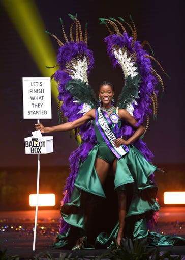 Dee-Ann Kentish-Rogers, Miss Great Britain 2018 walks on stage during the 2018 Miss Universe national costume presentation in Chonburi province on December 10, 2018. (Photo by Lillian SUWANRUMPHA / AFP)LILLIAN SUWANRUMPHA/AFP/Getty Images ORIG FILE ID: AFP_1BH7O4