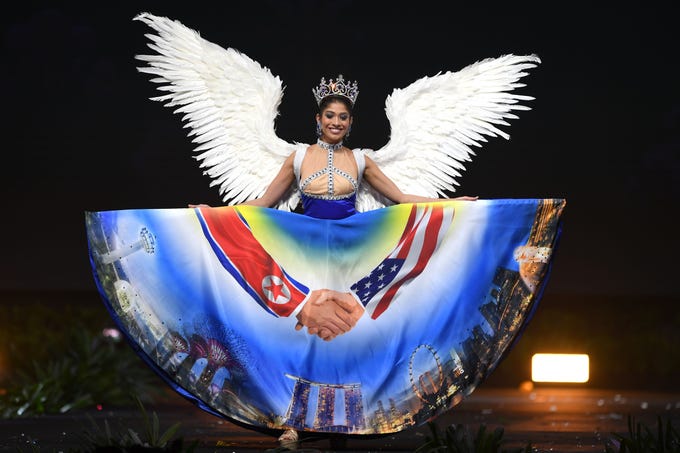 Zahra Khanum, Miss Singapore 2018 walks on stage during the 2018 Miss Universe national costume presentation in Chonburi province on December 10, 2018. (Photo by Lillian SUWANRUMPHA / AFP)LILLIAN SUWANRUMPHA/AFP/Getty Images ORIG FILE ID: AFP_1BH7S7