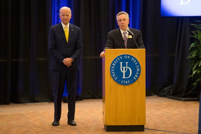 University of Delaware President Dennis Assanis, right, with UD alumnus Joe Biden, announces the naming of the Joseph R. Biden Jr. School of Public Policy and Administration on Tuesday at the Trabant Student Center.