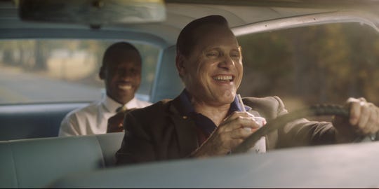 Tony Lip (Viggo Mortensen, right) is driver, confidante and security for famous pianist Don Shirley (Mahershala Ali) on a 1962 concert tour of the South in 'Green Book.'