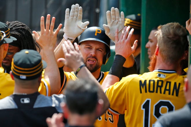 Jordy Mercer celebrates after hitting a home run in the sixth inning against the Padres during the game at PNC Park on May 20, 2018.