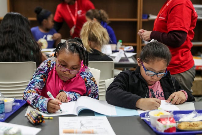 Third-grade girls participate in a Girls, Inc. of Greater Indianapolis session at Mary Castle Elementary in Indianapolis, Tuesday, Dec. 11, 2018. Girls Inc. of Greater Indianapolis is the local branch of a nonprofit that aims to make girls "strong, smart, andÊbold," offering eight, free six-week courses to 85 Indiana partner schools.