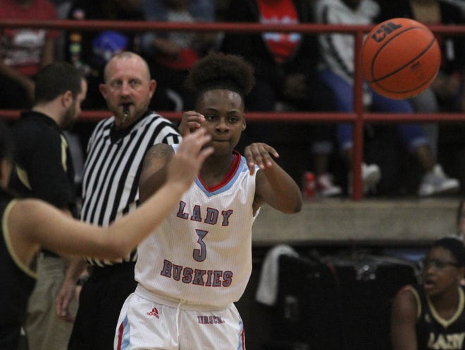 Hirschi's Eternity Hull passes in the game against Rider Tuesday, Dec. 11, 2018, at Hirschi. The Lady Huskies defeated the Lady Raiders 51-35.