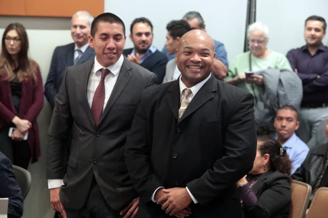 Indio City Council members Oscar Ortiz and Waymond Fermon at the city council meeting on Wednesday, December 12, 2018 in Indio where they were sworn in.