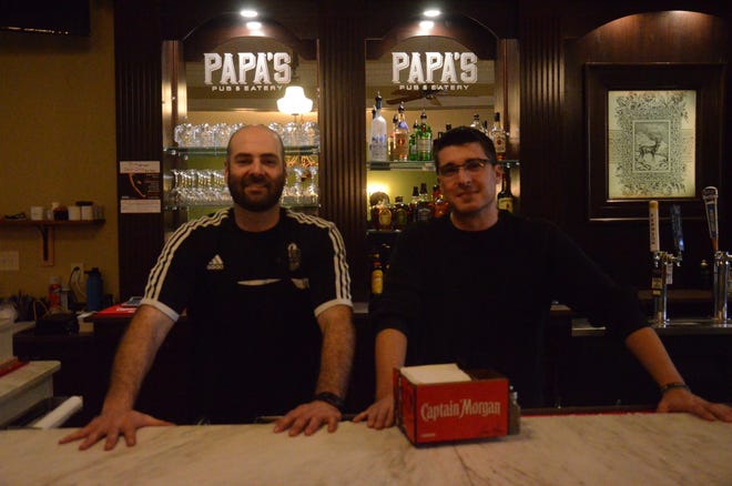 Owner David Ohayon (left) and manager Nick Surdis at the bar in the recently opened Papa's Pub & Eatery in Dell Rapids.